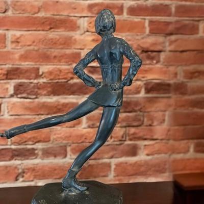 Woman Skating Figurine