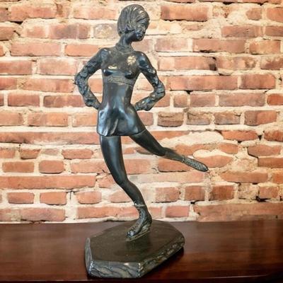 Woman Skating Figurine