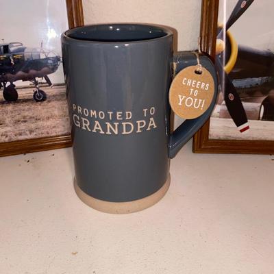 32 OUNCE "PROMOTED TO GRANDPA" MUG AND PHOTOGRAPHS OF AN OLD FIGHTER PLANE AND OTHER INTERESTING ITEMS