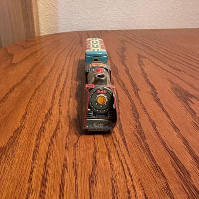 MINNEAPOLIS MOLINE DIECAST TOY TRACTOR & TIN LITHO FRICTION TRAIN