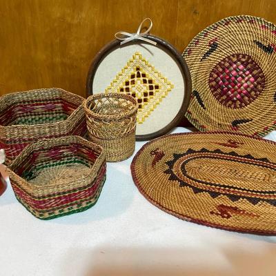 Wicker baskets and mats along with Hummel angel bell