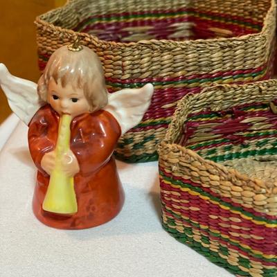 Wicker baskets and mats along with Hummel angel bell