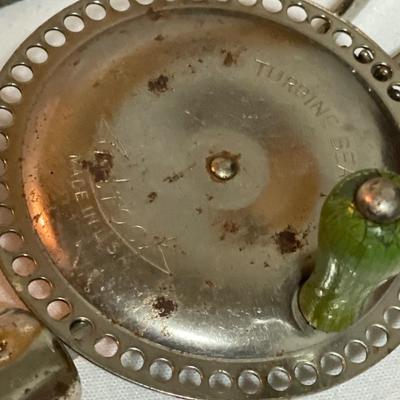 Vintage kitchen utensils and large Tupperware container