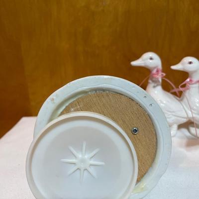 Geese in a row and music box