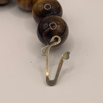 LOT 3: Collection of Tiger-eye Beaded Jewelry: 24" Strand of Tiger-eye Beads, Matching Stretch Bracelet, Pierced Earrings w 14k Gold...