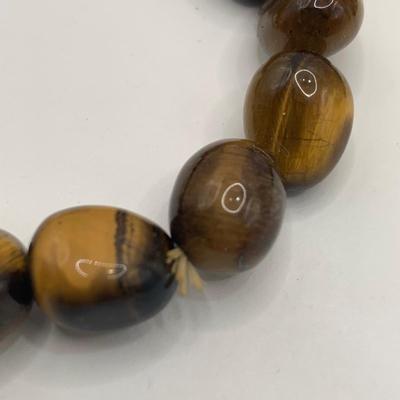 LOT 3: Collection of Tiger-eye Beaded Jewelry: 24" Strand of Tiger-eye Beads, Matching Stretch Bracelet, Pierced Earrings w 14k Gold...