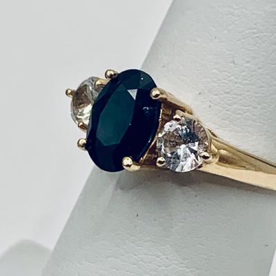 LOT4: Beautiful 14k Gold Ring with Oval Cut Blue Sapphire Flanked by 2 Round White Sapphires - 2.8 gtw sz5