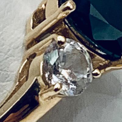 LOT4: Beautiful 14k Gold Ring with Oval Cut Blue Sapphire Flanked by 2 Round White Sapphires - 2.8 gtw sz5