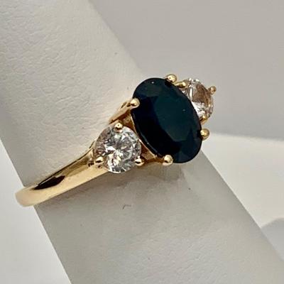 LOT4: Beautiful 14k Gold Ring with Oval Cut Blue Sapphire Flanked by 2 Round White Sapphires - 2.8 gtw sz5