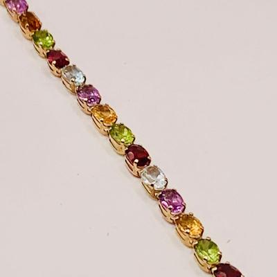 LOT 8: Semi-Precious Oval Faceted Gemstone and 14K Gold Bracelet - Blue Topaz, Amethyst, Garnet, Citrine, Peridot 7" Long 6.2 gtw