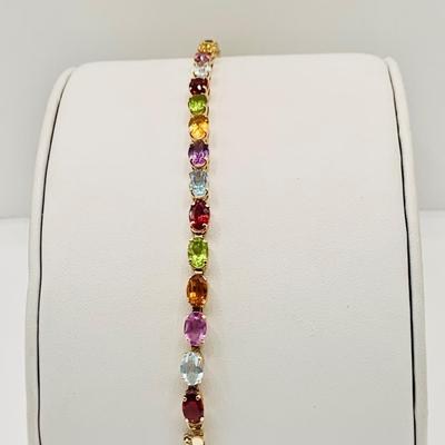LOT 8: Semi-Precious Oval Faceted Gemstone and 14K Gold Bracelet - Blue Topaz, Amethyst, Garnet, Citrine, Peridot 7" Long 6.2 gtw