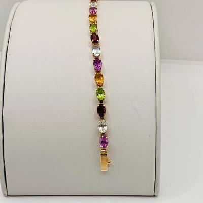 LOT 8: Semi-Precious Oval Faceted Gemstone and 14K Gold Bracelet - Blue Topaz, Amethyst, Garnet, Citrine, Peridot 7" Long 6.2 gtw