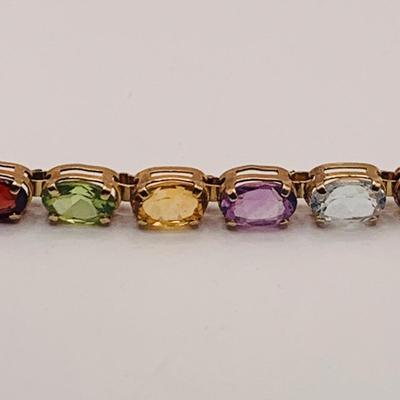 LOT 8: Semi-Precious Oval Faceted Gemstone and 14K Gold Bracelet - Blue Topaz, Amethyst, Garnet, Citrine, Peridot 7" Long 6.2 gtw