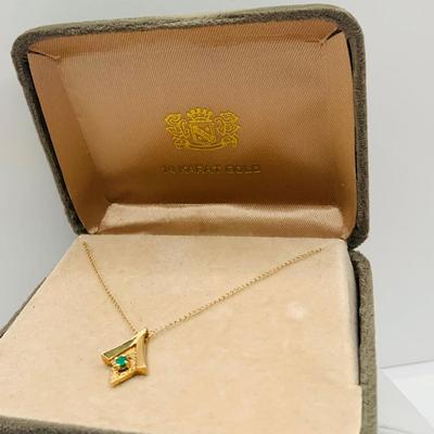 LOT 14: Emerald and 14KP Gold Pendant on 18" Gold Chain