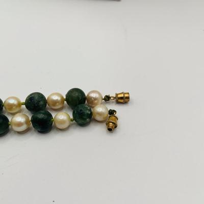 LOT 27: Collection of Beaded Fashion Jewelry Necklaces Featuring a Cloissonne Elephant Pendant on a Silk Cord and More