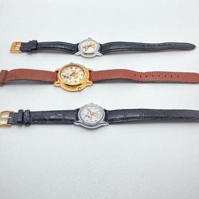 LOT 55J: Three Disney Mickey Mouse (Lorus / Ingersoll) Watches and One Stars and Stripes Mickey Mouse Pin