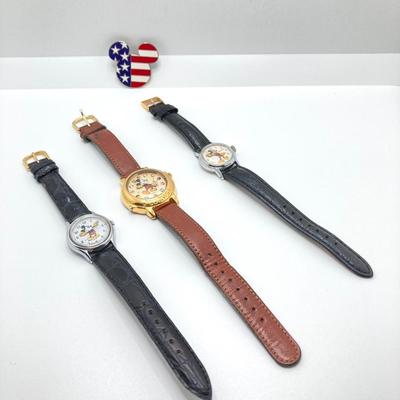 LOT 55J: Three Disney Mickey Mouse (Lorus / Ingersoll) Watches and One Stars and Stripes Mickey Mouse Pin