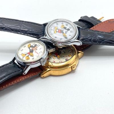 LOT 55J: Three Disney Mickey Mouse (Lorus / Ingersoll) Watches and One Stars and Stripes Mickey Mouse Pin