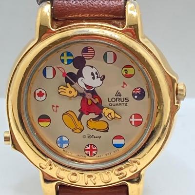 LOT 55J: Three Disney Mickey Mouse (Lorus / Ingersoll) Watches and One Stars and Stripes Mickey Mouse Pin