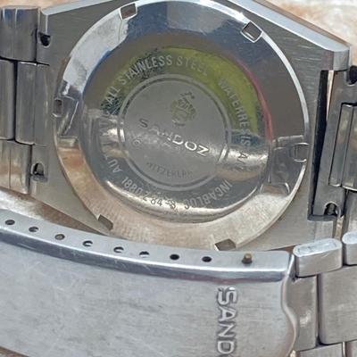 LOT 58J: Sandoz Swiss Calendar Watch and Identity Swiss Watch