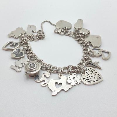 LOT 64J: James Avery Sterling Silver Charm Bracelet (16 Charms) with Original Box - TW 48.9g