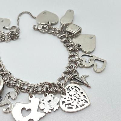 LOT 64J: James Avery Sterling Silver Charm Bracelet (16 Charms) with Original Box - TW 48.9g
