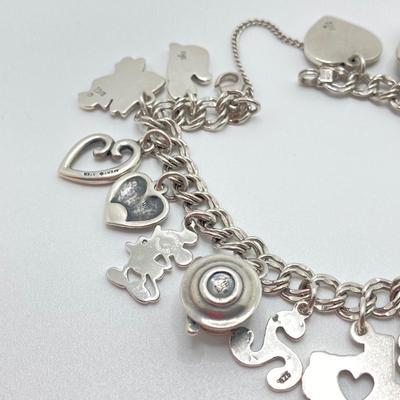 LOT 64J: James Avery Sterling Silver Charm Bracelet (16 Charms) with Original Box - TW 48.9g