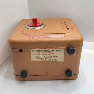 LOT 80J: Collection of Vintage Banks - The Varney Dry Goods Company, Fort Knox Safe Combination Bank and Peoples National Bank of New...