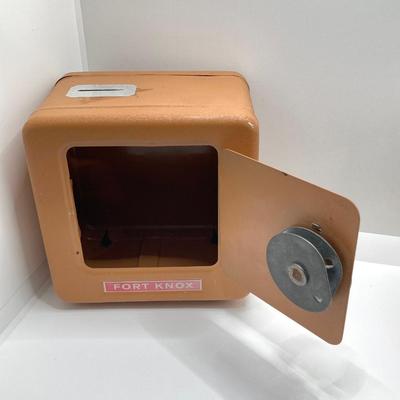 LOT 80J: Collection of Vintage Banks - The Varney Dry Goods Company, Fort Knox Safe Combination Bank and Peoples National Bank of New...