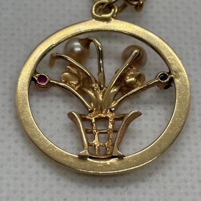 LOT 85: Cultured Pearl & Gold Bracelet w/Charm: 750 (18k) on Clasp, 14K Charm w/2 Pearls & 2 Gemstones, 10.7g Tw, 7.5"