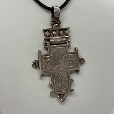 LOT 92: Sterling Silver 925 Cross Pendant on a Waxed Leather Cord & Sterling Silver Chain w/a Religious Pendant/Charm