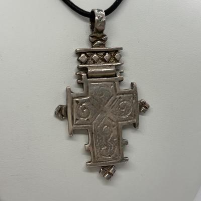 LOT 92: Sterling Silver 925 Cross Pendant on a Waxed Leather Cord & Sterling Silver Chain w/a Religious Pendant/Charm
