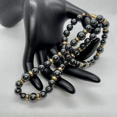 LOT 97: Hematite & Gold Beaded Necklace 14K on Clasp along w/Matching Earrings 14K on Stem