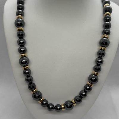 LOT 97: Hematite & Gold Beaded Necklace 14K on Clasp along w/Matching Earrings 14K on Stem