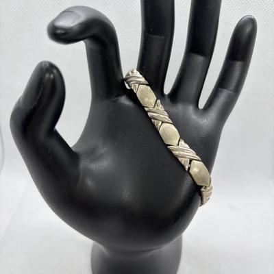 LOT 105: Sterling Silver Hugs & Kissing 7" Bracelet, Onyx Tear Drop Earrings & Avon 925 Blue Topaz Earrings