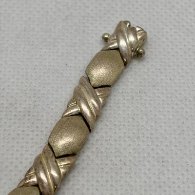 LOT 105: Sterling Silver Hugs & Kissing 7" Bracelet, Onyx Tear Drop Earrings & Avon 925 Blue Topaz Earrings