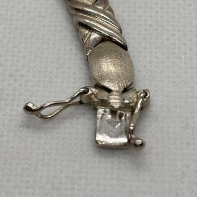 LOT 105: Sterling Silver Hugs & Kissing 7" Bracelet, Onyx Tear Drop Earrings & Avon 925 Blue Topaz Earrings