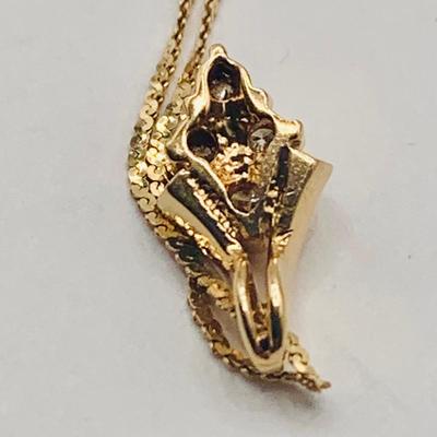 LOT 167: Beautiful Diamond and 14 K Gold Pendant on 16" Gold Chain 1.76g tw