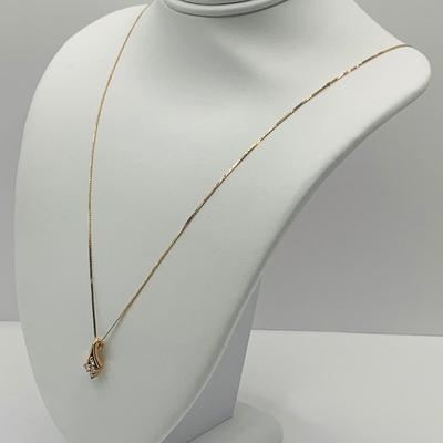 LOT 167: Beautiful Diamond and 14 K Gold Pendant on 16" Gold Chain 1.76g tw