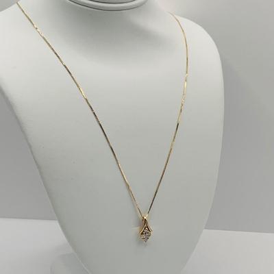 LOT 167: Beautiful Diamond and 14 K Gold Pendant on 16" Gold Chain 1.76g tw