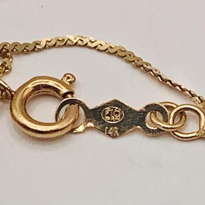 LOT 167: Beautiful Diamond and 14 K Gold Pendant on 16" Gold Chain 1.76g tw