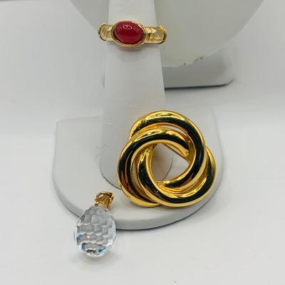 LOT:172: Collection of Goldtone Fashion Jewelry and More Including RER Bererb Ring, Bulls Eye Seed Pendant, Monet Goat Pendant and Chain...