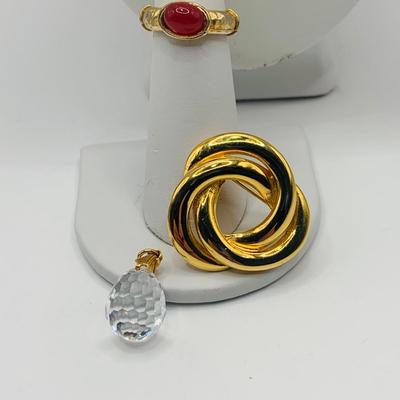 LOT:172: Collection of Goldtone Fashion Jewelry and More Including RER Bererb Ring, Bulls Eye Seed Pendant, Monet Goat Pendant and Chain...