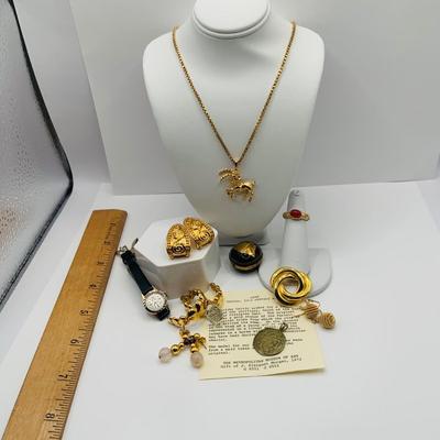 LOT:172: Collection of Goldtone Fashion Jewelry and More Including RER Bererb Ring, Bulls Eye Seed Pendant, Monet Goat Pendant and Chain...
