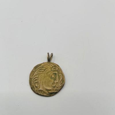 LOT:172: Collection of Goldtone Fashion Jewelry and More Including RER Bererb Ring, Bulls Eye Seed Pendant, Monet Goat Pendant and Chain...