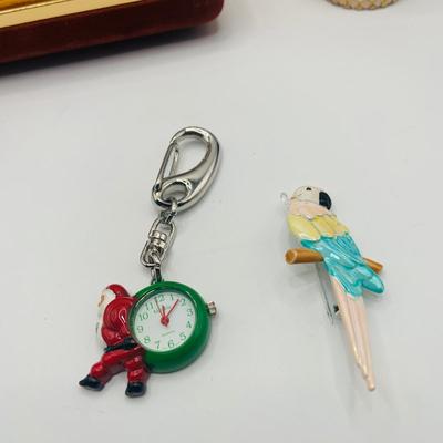 LOT176: Large Assortment of Fashion Jewelry Including a Jewelry Box of Earrings, Whimsical Pins, Avon and More