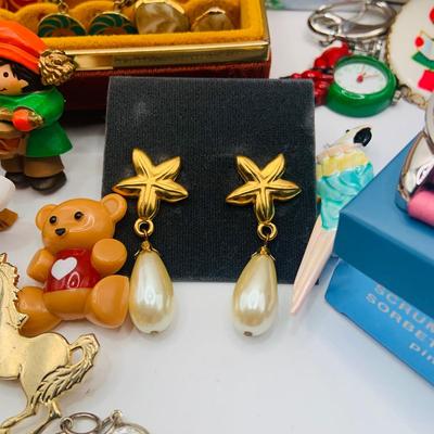 LOT176: Large Assortment of Fashion Jewelry Including a Jewelry Box of Earrings, Whimsical Pins, Avon and More