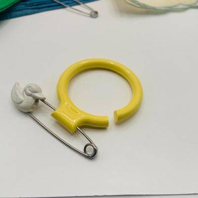 LOT 178: Assortment of Vintage Childrens Jewelry, Kit Gloves, Toys, Games Including Keys to Phildelphia Zoo, Kitty in the Keg Diaper Pins...