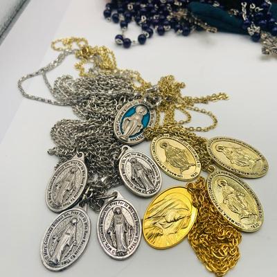 LOT 179: Collection of Rosery Beads, Saint Metals and More