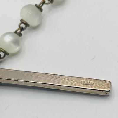 LOT 179: Collection of Rosery Beads, Saint Metals and More